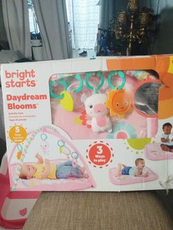Bright Stars baby Play Mat with toys.