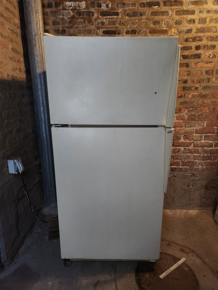 Refrigerator , only the handle is a little broken. and water is dripping from the freezer a little bit