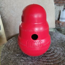 Kong Dog Food Or Treat Dispenser. Entertains Dogs.