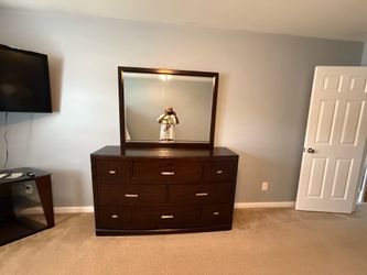 Wooden dresser with mirror