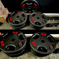GPI 35LB URETHANE OLYMPIC WEIGHTS 2" RUBBER WEIGHT PLATES $60 A PAIR

