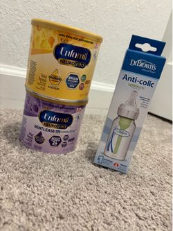 Two 7.2 oz baby formulas Dr. Brown bottle and 4 unused pacifiers