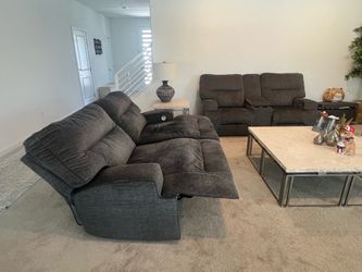 Power reclining sofa and love seat
