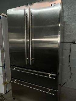 GE Monogram 36" wide French-Door Refrigerator with middle convertible drawer.