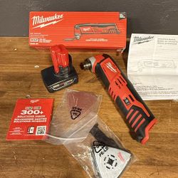 Milwaukee Oscillating Multi-tool WITH M12 Red Lithium XC4.0 battery. 