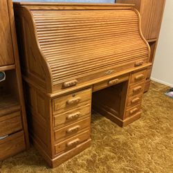 Wood   Roll top computer / Business desk .   See pictures. $ 400.  Bring your help and truck to load . Cash only VERY HEAVY.