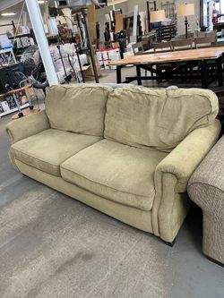 Pale green couch (in store)