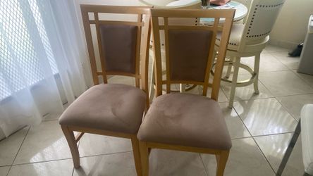 Two wooden chairs  like new