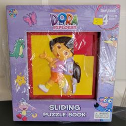 DORA the EXPLORER SLIDING PUZZLE BOOK...STORYBOOK & 4 PUZZLES 
