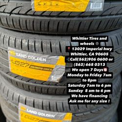 SET OF NEW TIRES, 