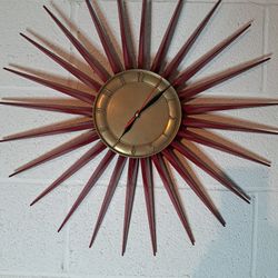 Old antique starburst clock