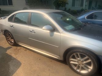 Silver Chevrolet Impala