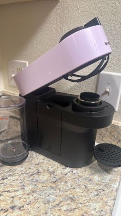 Pink Nespresso coffee maker