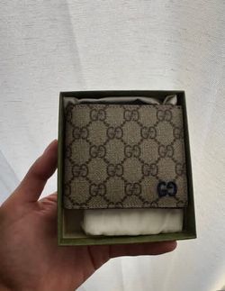 Gucci Brown Interior GG bi-fold wallet