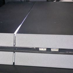 PS4, DualShock Controllers w/Charging Base and Games