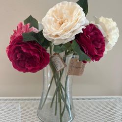 glass vase with fake flowers