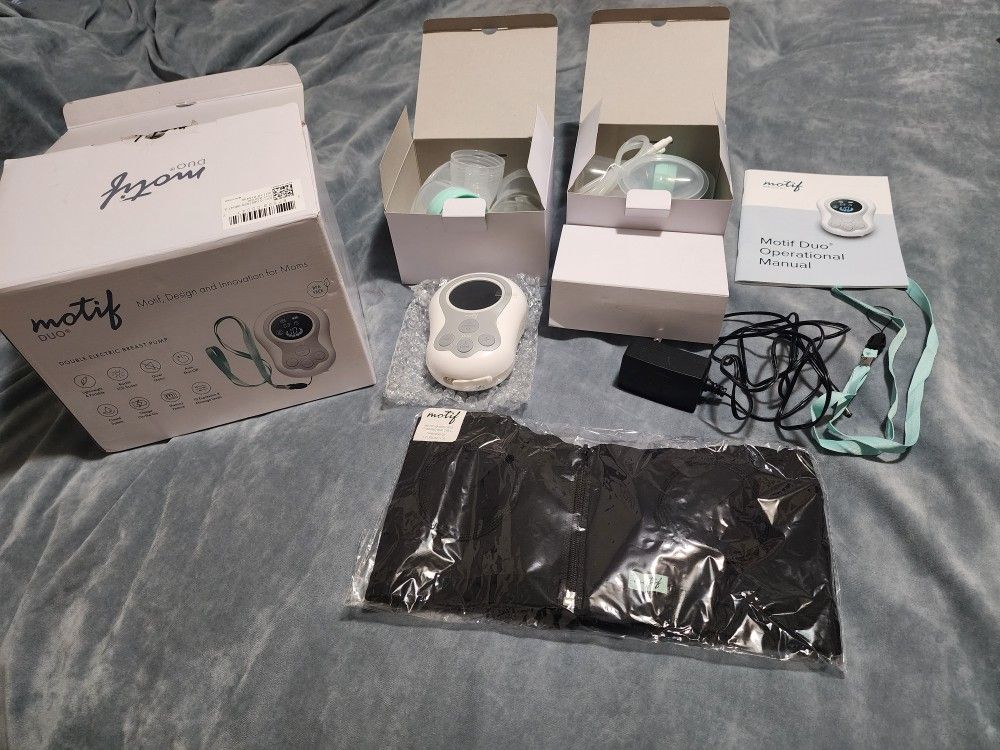 Motif Duo Double Electric Breast Pump. New, but open box. 