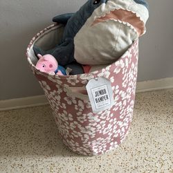 Stuffed animals and hamper