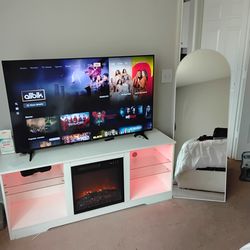55inch TCL TV  60inch TV STAND/FIREPLACE (HEAT and  LED LIGHTS) and STAND UP MIRROR
