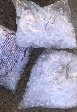 Three brand new Bags of blood vials