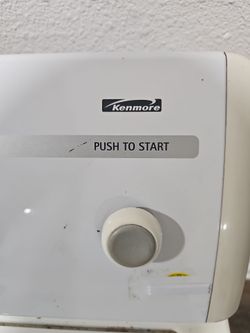 Dryer  machine: Kenmore,  white.