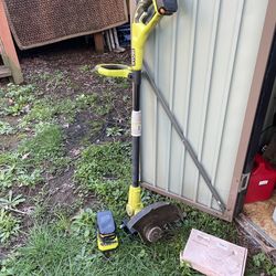 Ryobi battery powered weed wacker/edger with charger an