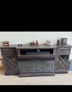 Entertainment center with electric fireplace