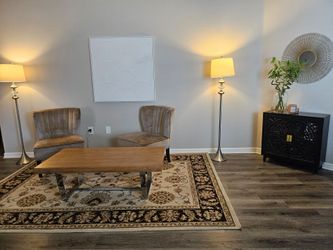 Accent chair, coffe table, floor lamps, black accent cabinet