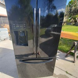 Refridgerator ( black. Bottom freezer, works well )