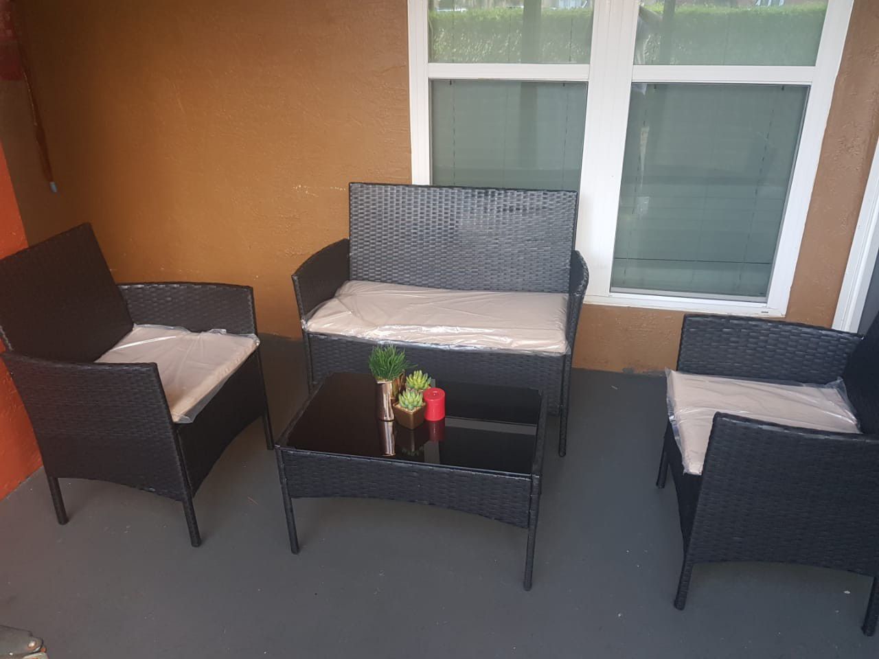Brand new outdoor patio furniture set with table and cushions