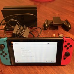 Nintendo Switch  W/ Accessories 