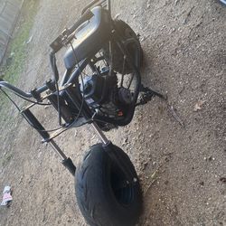 Coleman mini bike runs awesome just needs  brakes and a back tire it goes flat but holds air