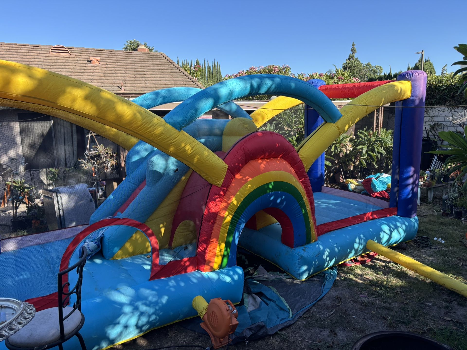 Large Jumper With Climbing Wall Slide, And Tunnel