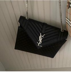 Black YSL quilted shoulder bag
