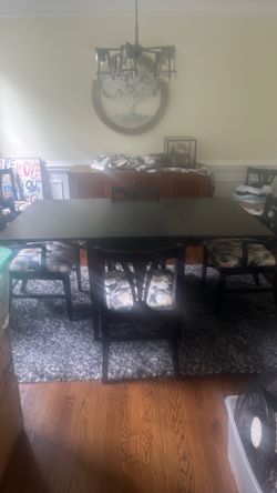 Vintage black table with 6 chairs