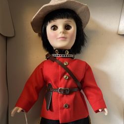 International porcelain doll: Canadian Mountie 🇨🇦 