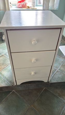 White bedside table