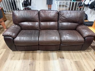 Brown Leather all Reclining Sofa and love seat