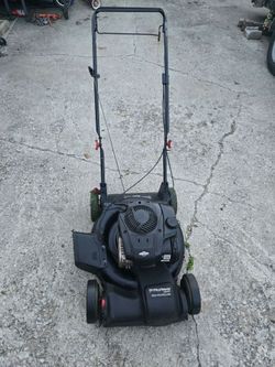 Self-propelled lawnmower in good working condition for sale.