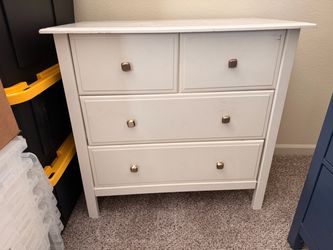 White 4-Drawer Dresser with Silver Knobs
