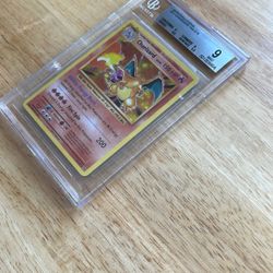 Pokémon 2016 Evolutions #11 Charizard Beckett 9 Mint 