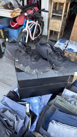 All black Kyrie shoes