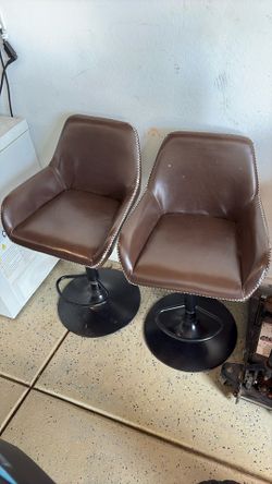 Two Adjustable Leather Chairs