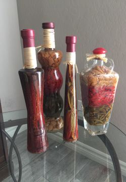 Preserved veggie and herb bottles.