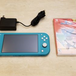 Blue Nintendo Switch Lite With Charger And Monopoly/Risk/Trivial Pursuit $129