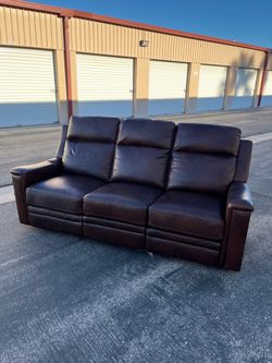 Top grain leather reclining sofa ( can deliver for $10 )