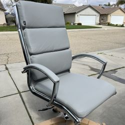 Brand New. Light Grey/chrome High Back Executive Office Chair. Retails Around $400