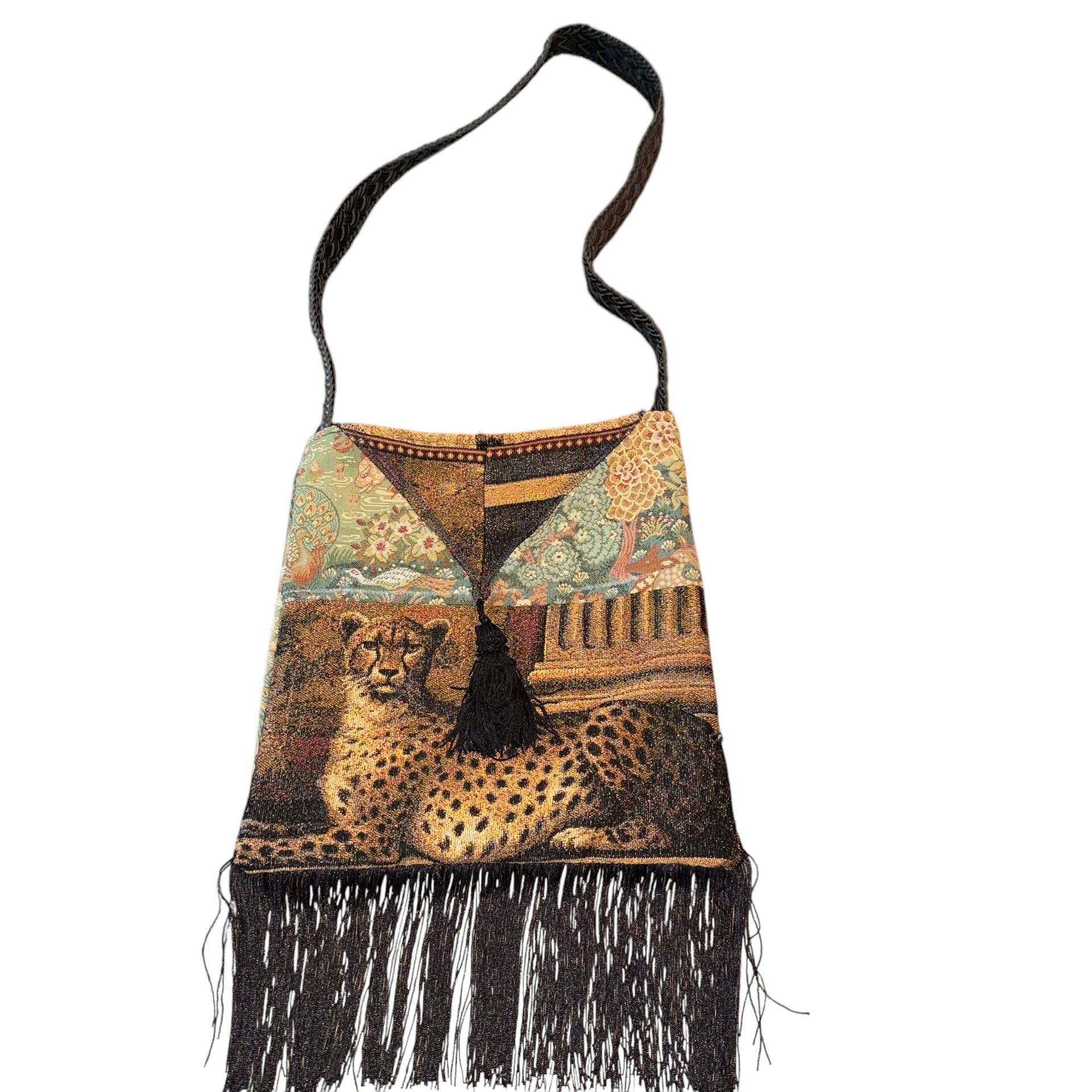 Upcycled Boho Fringe Crossbody Shoulder Bag Cheetah Handmade Reworked Crossbody  This handmade crossbody shoulder bag is a unique and stylish accessor