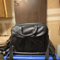 Assorted Lap Top And Brief Cases.