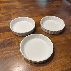 Set of three white ramekins 